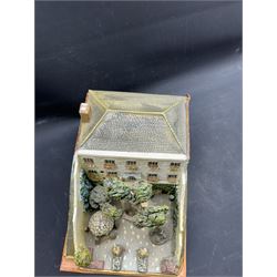 Mixed medium sculpture of house and garden, with makers mark beneath, H15cm