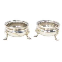 Silver double condiment set comprising pair of salts, pair of pepperettes and pair of mustards with hinged lids all on shaped supports London 1937-40 marked for W Greenwood & Sons