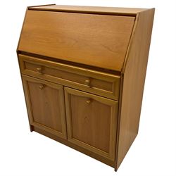 Mid 20th century teak bureau, sloped fall-front opening to reveal fitted interior with compartments, over panelled full width drawer and two cupboard doors, on recessed plinth base