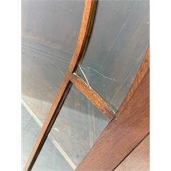 19th century mahogany floor-standing corner display cabinet, moulded cornice over blind fretwork frieze, enclosed by single astragal glazed door, the interior fitted with three shelves, on bracket feet