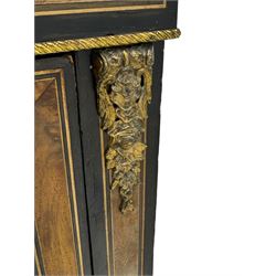 Victorian ebonised and walnut pier cabinet, rectangular top over figured frieze with central star motifs, enclosed by single glazed door, decorated with cast gilt metal mounts and beading, on chamfered plinth base 