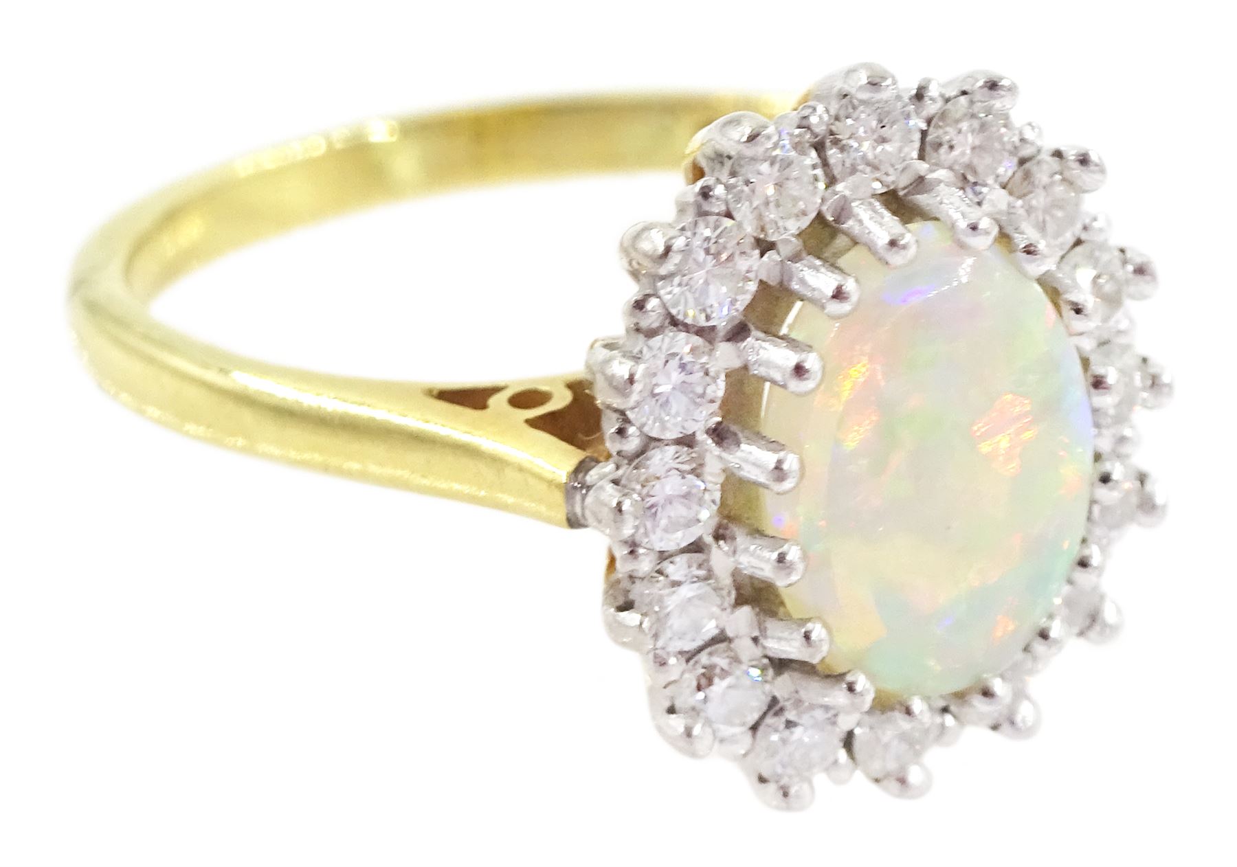 18ct gold opal and round brilliant cut diamond cluster ring, hallmarked, opal 0.66 carat, total diamond weight 0.36 carat