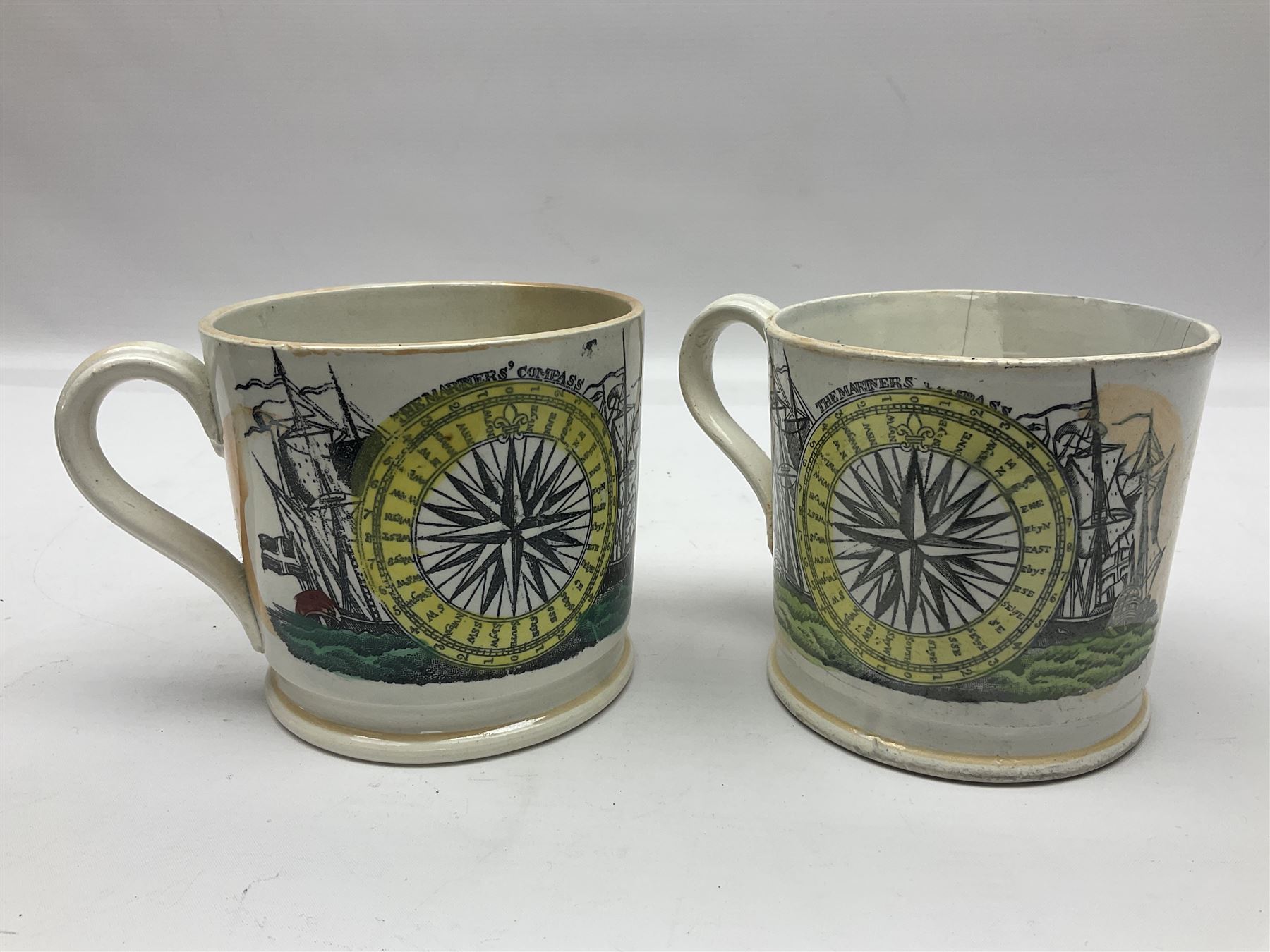 Two Staffordshire mugs, both depicting 'The Mariner's Compass' to body, with lustre decoration, the first example with 'The Sailor's Tear' quote verso, the second with 'The Sailor's Farewell', tallest H10cm