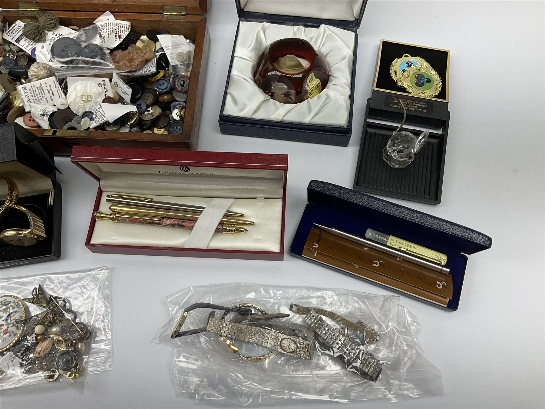 A collection of Vintage and later costume jewellery and wrist watches, to include a ladies Bulova bark effect watch, a silver brooch, hallmarked London import, boxed Webb Corbett paperweight, small Swarovski figure, together with a 19th century burr walnut box, a smaller brass bound mahogany box, etc. 