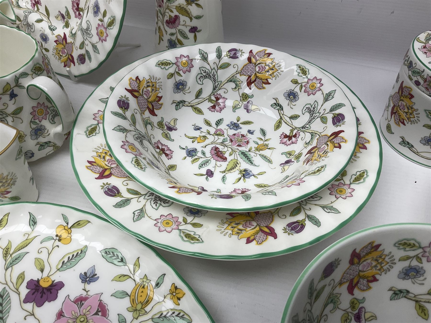 Minton Haddon Hall part tea service, including teapot, covered sucrier, milk jug, six teacups and saucers of various sizes, covered preserved jar, to vases etc (38)