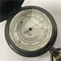 Early 20th century gunmetal pocket compensated barometer, by Aitchison London, the dial with outer central thermometer and outer altometer track, contained within tooled leather, velvet and silk lined fitted case, D = 5.3cm