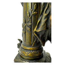 After L & F Moreau - Spelter table lamp in the form of a female figure next to a pedestal on circular naturalistic base H55cm