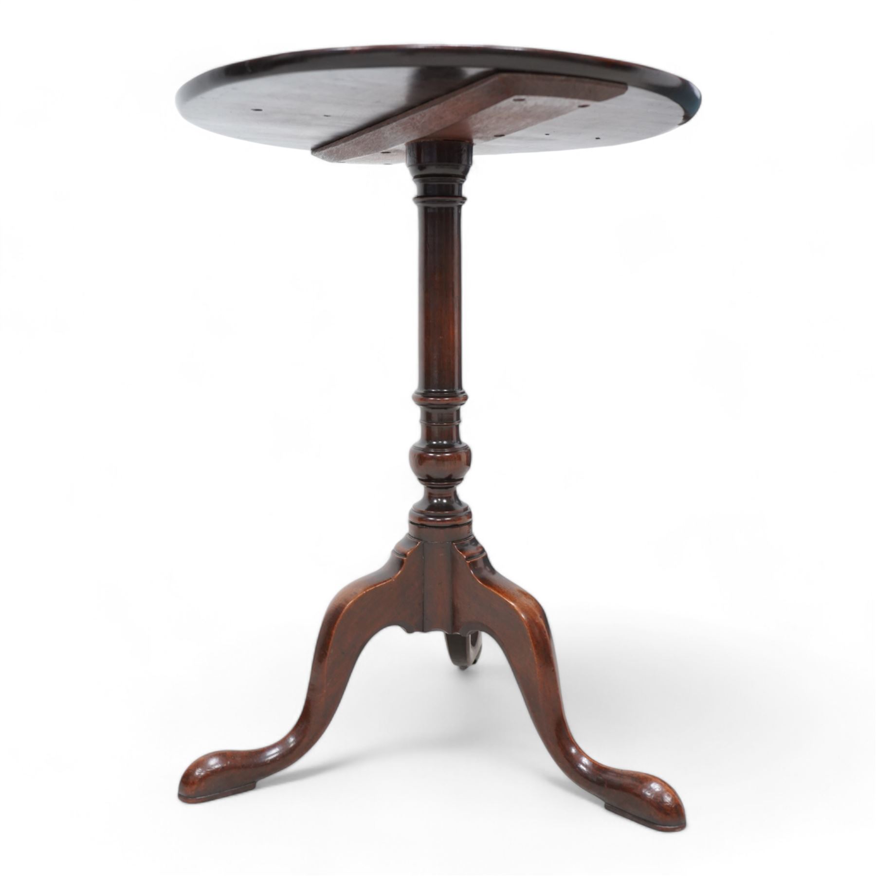 George III mahogany wine table, the circular dished top raised on a turned pedestal, terminating to a tripod base with splayed supports 