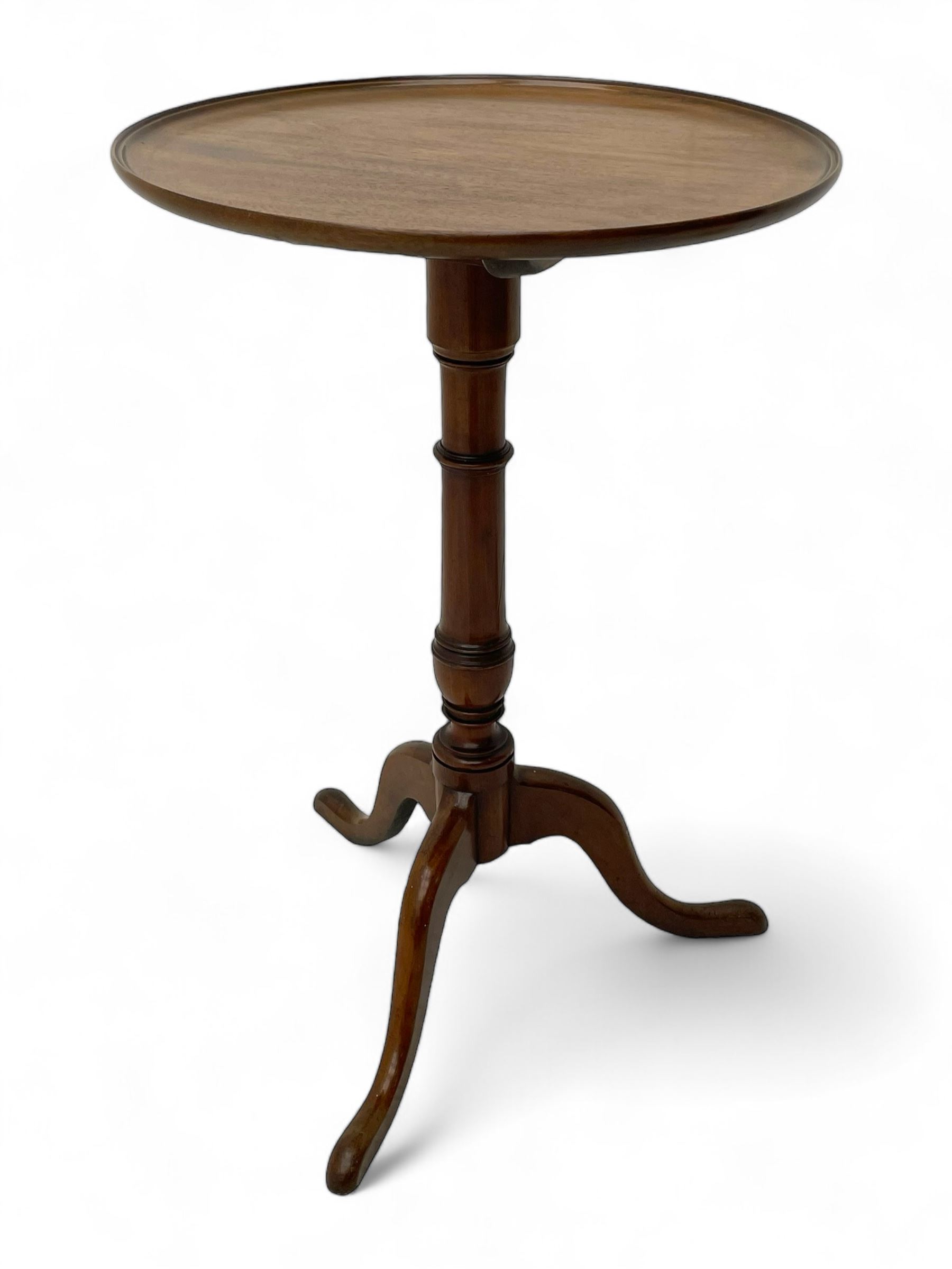 George III mahogany tripod table, circular moulded dished tilt-top, ring turned stem on three splayed supports 