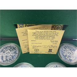 Queen Elizabeth II Isle of Man 1980 'Commemorating the 1980 Olympics' silver proof crown four coin set and 1979 '1000th Anniversary of Tynwald' silver proof crown five coin set, both sets cased with certificates 