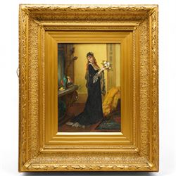 French School (Early 20th century): Interior Scene with an Elegant Lady in a Black Lace Dress holding a Bouquet of White Roses, oil on canvas unsigned 34cm x 24cm