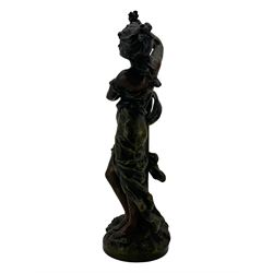 After L & F Moreau - Spelter table lamp in the form of a female figure next to a pedestal on circular naturalistic base H55cm