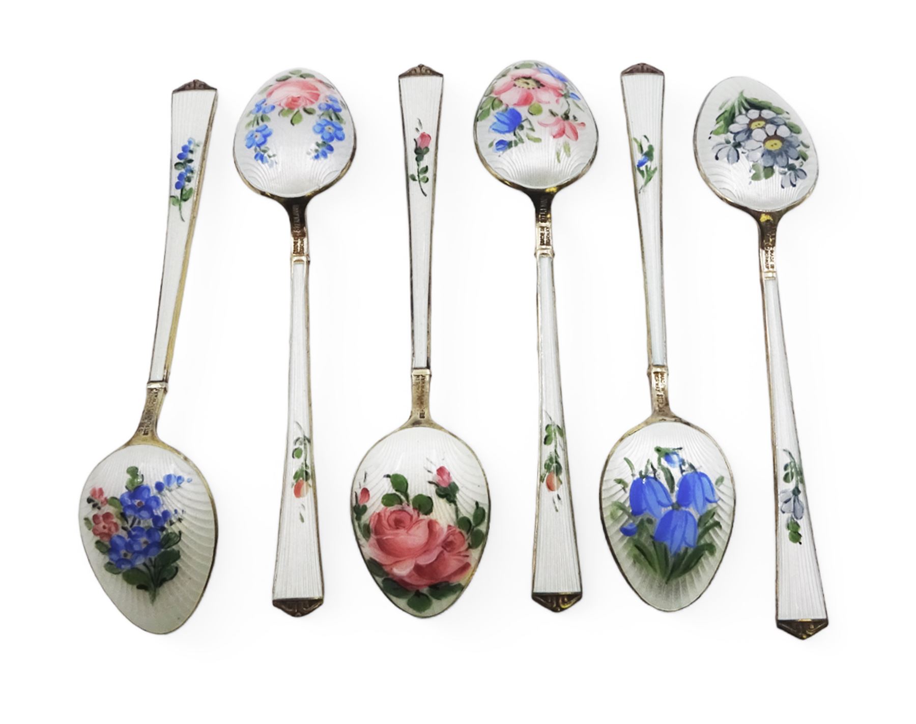 Set of six Norwegian silver-gilt and enamel demitasse spoons, decorated front and verso with small colourful flowers on a white ground,  925S Sterling, in retailers box for Magnus Aase, Bergen