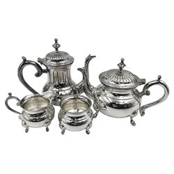 Miniature silver plated four piece tea service, comprising coffee pot, teapot, milk jug and sugar bowl, stamped GRC EPNS beneath, coffee pot H16cm