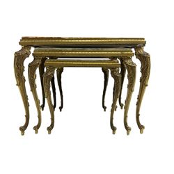 Mid-20th century Italian design onyx and gilt metal nest of three tables, rectangular tops raised on foliate decorated cabriole supports