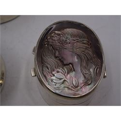 Four silver boxes, comprising oval example embossed with horse and rider, a rectangular example set with heart shaped amethyst, an oval example with set with carved abalone shell portrait, and a circular example set with Victorian penny, all hallmarked 