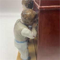 19th century Continental jar and cover, modelled as a classroom, with the teachers desk as the cover, H27cm