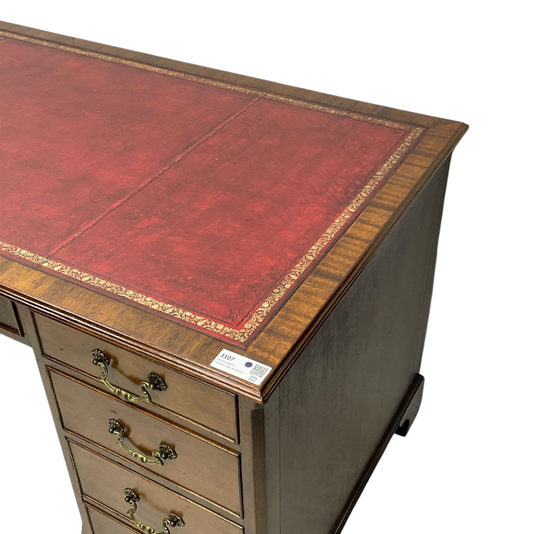 Georgian design mahogany twin pedestal desk, moulded rectangular top with red leather inset, fitted with seven drawers, on bracket feet 