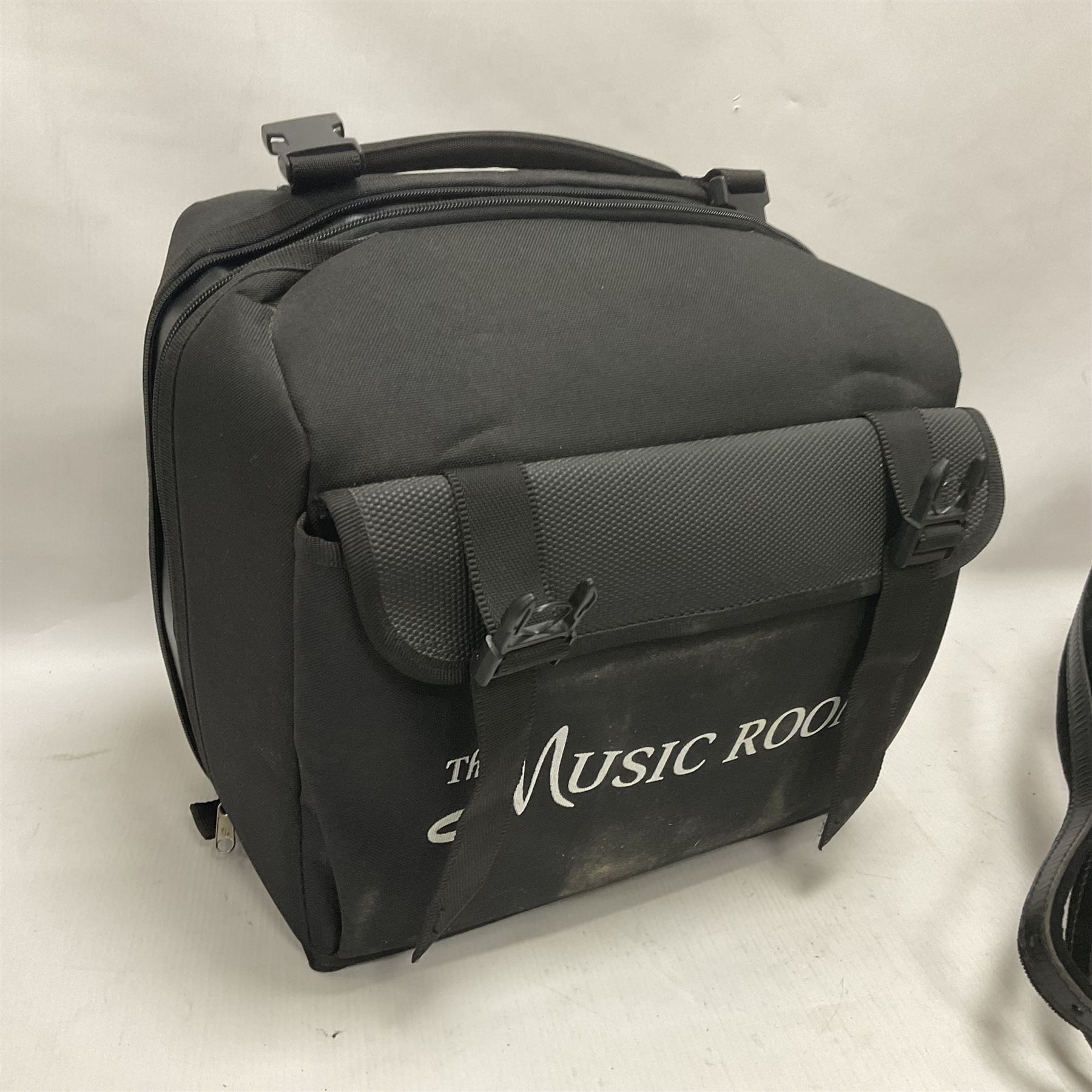 Hohner Double Ray black dot button melodeon in B/C; modern Irish style with eight bass and twenty-one treble buttons and double strap, with soft carrying case