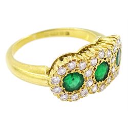 18ct gold emerald and diamond cluster ring, three round cut emeralds, with round brilliant cut diamond surround, London 1976