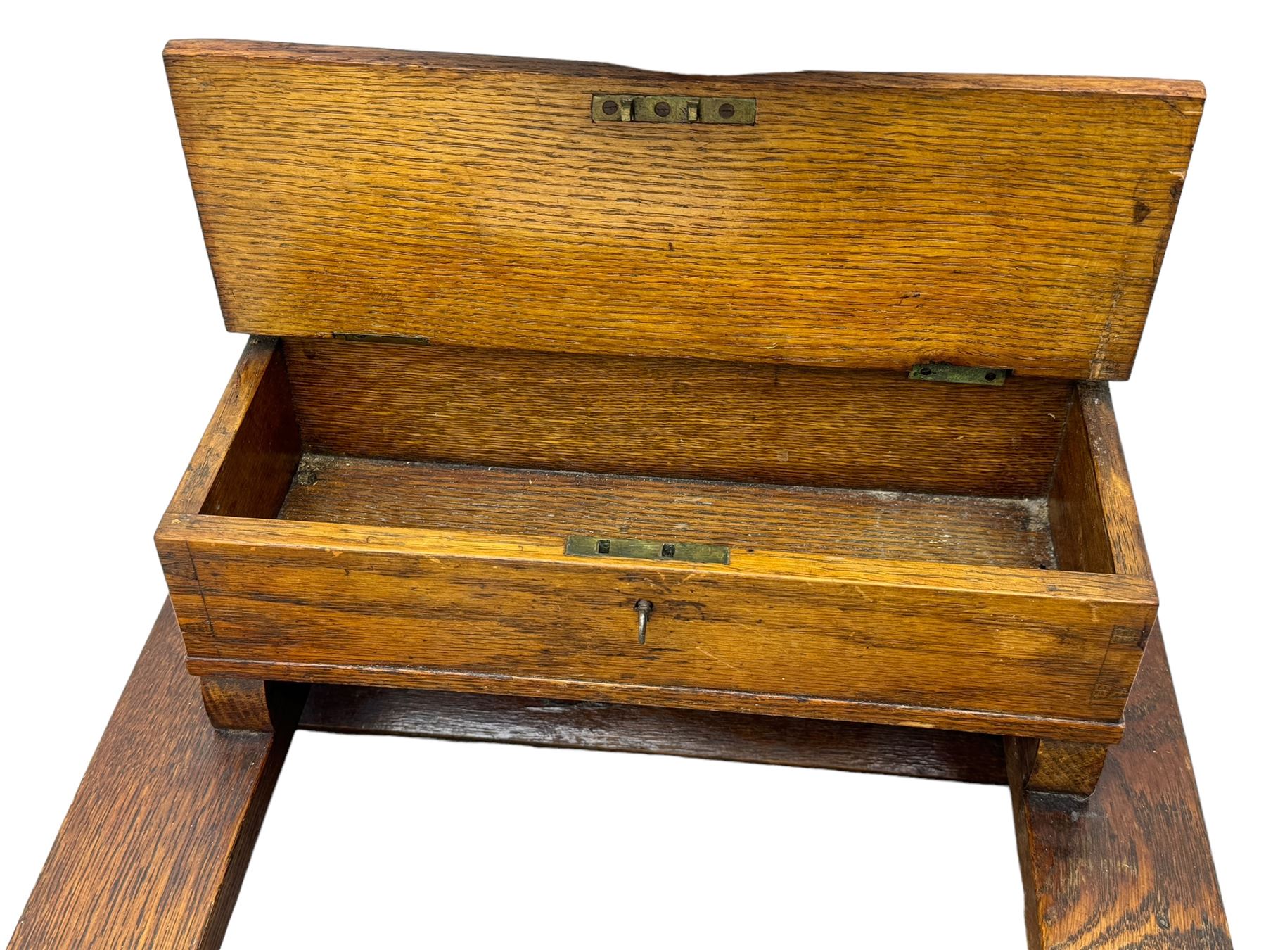 Early 20th century oak vanity stand, with circular adjustable mirror, brass towel rails to the sides, marble inset top and upper compartment, over additional storage compartment with hinged front, on splayed supports with stretchers