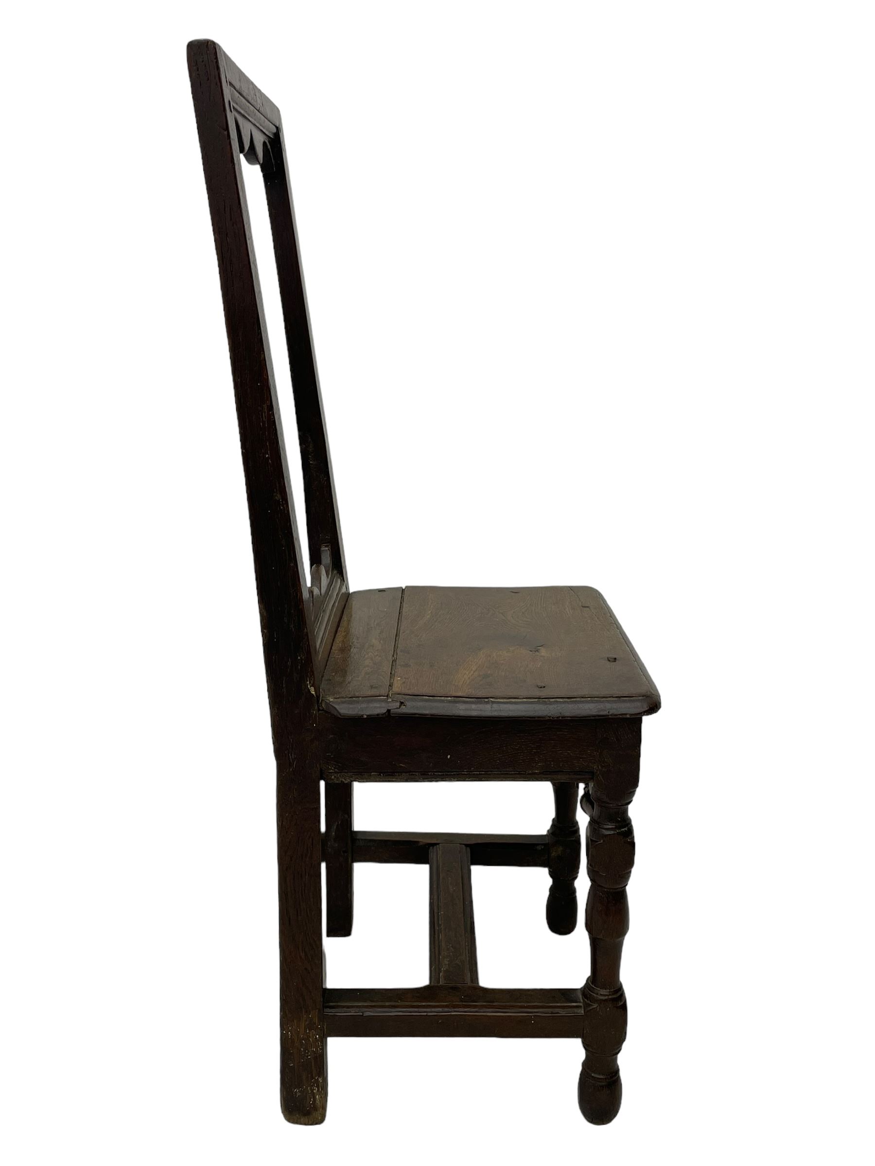 Small late 17th century oak side chair, open frame back with shaped upper and lower brackets, moulded plank seat, on turned supports united by moulded H-shaped stretchers