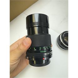 Seventeen Canon camera lenses, mostly FD examples, including 28-85mm 1:4 serial no, 49881, 35-105mm 1:3.5-4.5 serial no. 87632 and 135mm 1:2.8 serial no. 48336, one boxed