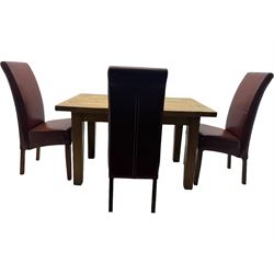 Oak dining table, rectangular plank with two extension leaves at each end, central drawer with brass handle, supported by square legs (L131cm - 233cm, D80cm, H76cm); four high-back dining chairs, the chairs upholstered in dark brown leatherette with stitched detailing, on square tapering legs (H108cm)