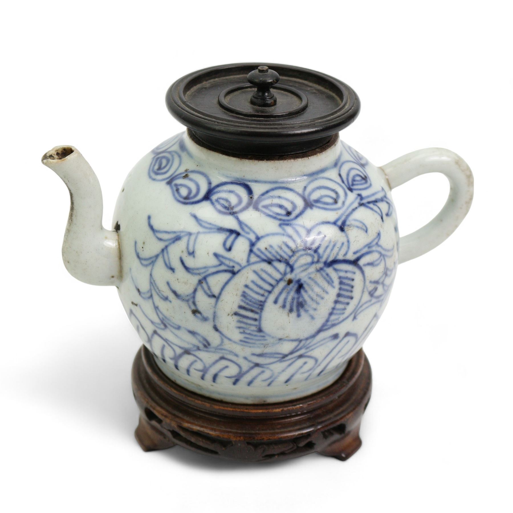 Chinese blue and white ginger jar, with sepia decoration, possibly unfinished, double ring mark beneath, H21cm, Chinese blue and white prunus pattern charger, D37.5cm, Japanese vase and a Chinese blue and white teapot, with associated cover and stand (4)