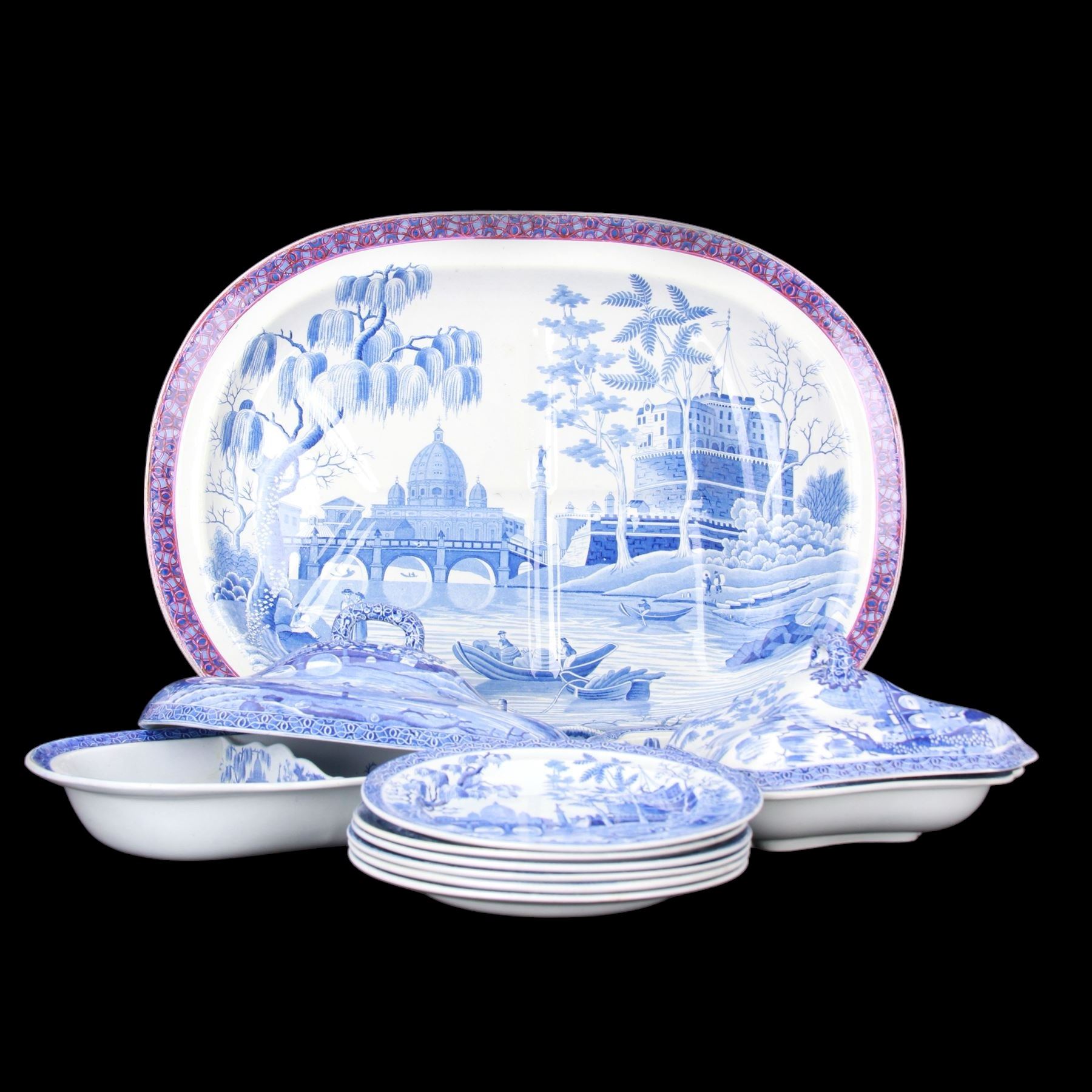 19th century Spode blue and white dinner service for six place settings, decorated in the Tiber pattern, comprising six dinner plates, six dessert plates, meat drainer with red clobbered edge, oval serving dish with twin compartmented interior and matched cover, square serving dish with cover, and two oval platters