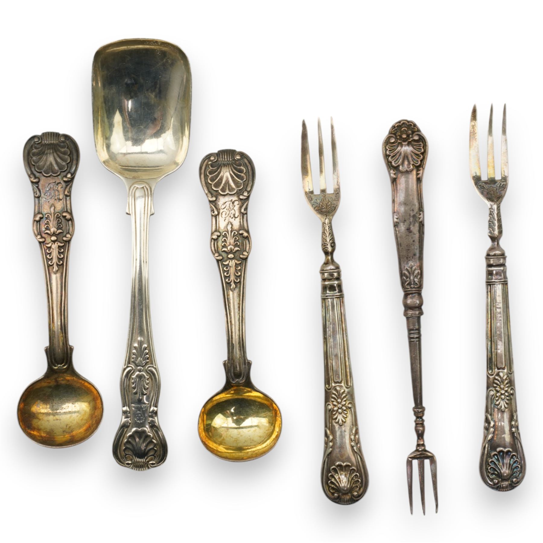 A matched set of 19th century silver Kings pattern cutlery comprising six table spoons, ten table forks, twelve dessert spoons, fish slice, pair of sauce ladles, ten teaspoons, six fish knives, seven silver handled knives, two salt spoons  and fifteen dessert forks, various dates and makers 