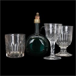 Bristol green glass flagon, together with glass rummer with slice cut flute upon a polished stepped foot, together with two other glasses 