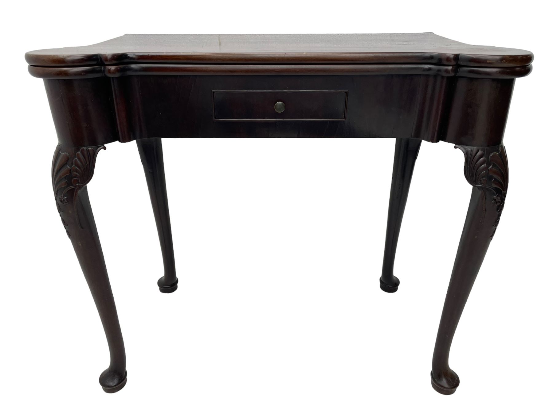 Late 18th century Irish mahogany tea table, rectangular form with projecting stepped rounded corners, fold-over action top over single frieze drawer within cock-beaded surround, on shell and bellflower carved cabriole supports, single gate-leg action base 