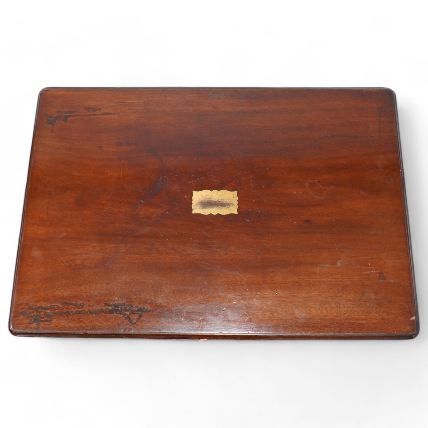 19th century mahogany silver or collectors cabinet, moulded rectangular top over two panelled doors, fitted with a combination of drawers with fitted baize lined interiors, two brass carrying handles to each side 