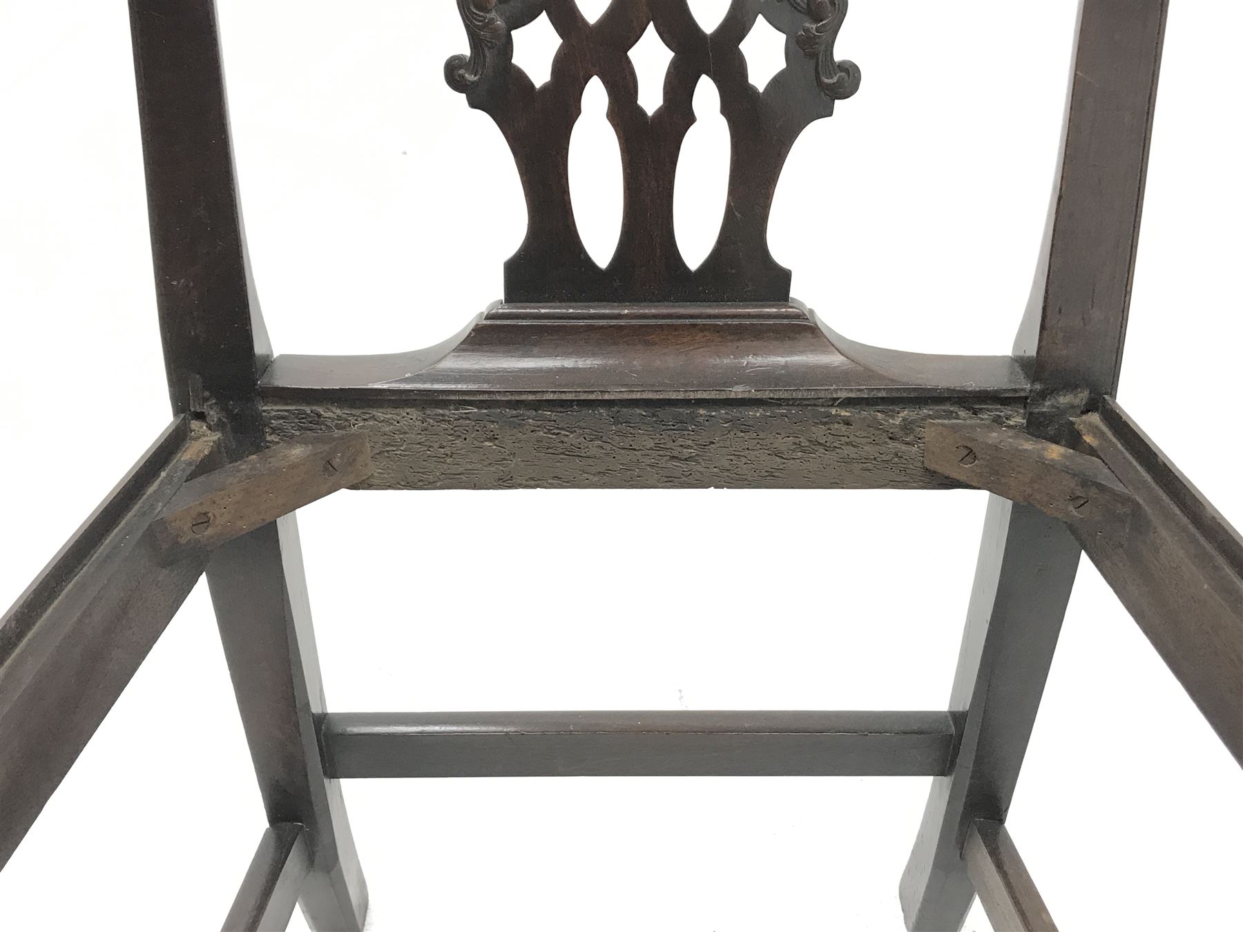 Georgian mahogany armchair, shaped cresting rail over a Gothic pierced splat, arms with acanthus scrolled terminals, leather drop in seat, moulded square supports, W62cm (total)