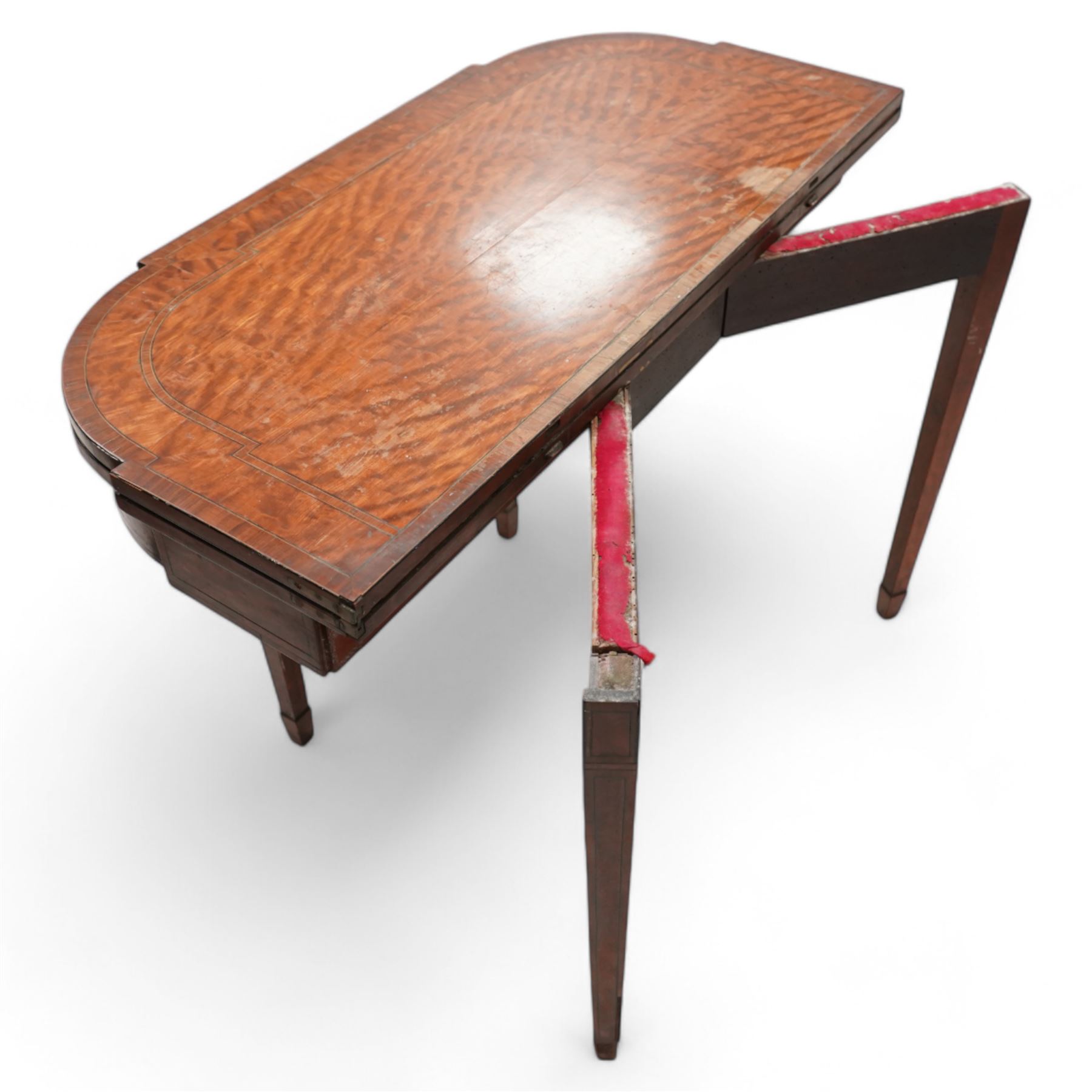 Sheraton period satinwood card table, stepped D-end form, fold-over top revealing baize playing surface, double gate-leg action base, on square tapering supports with peg feet 