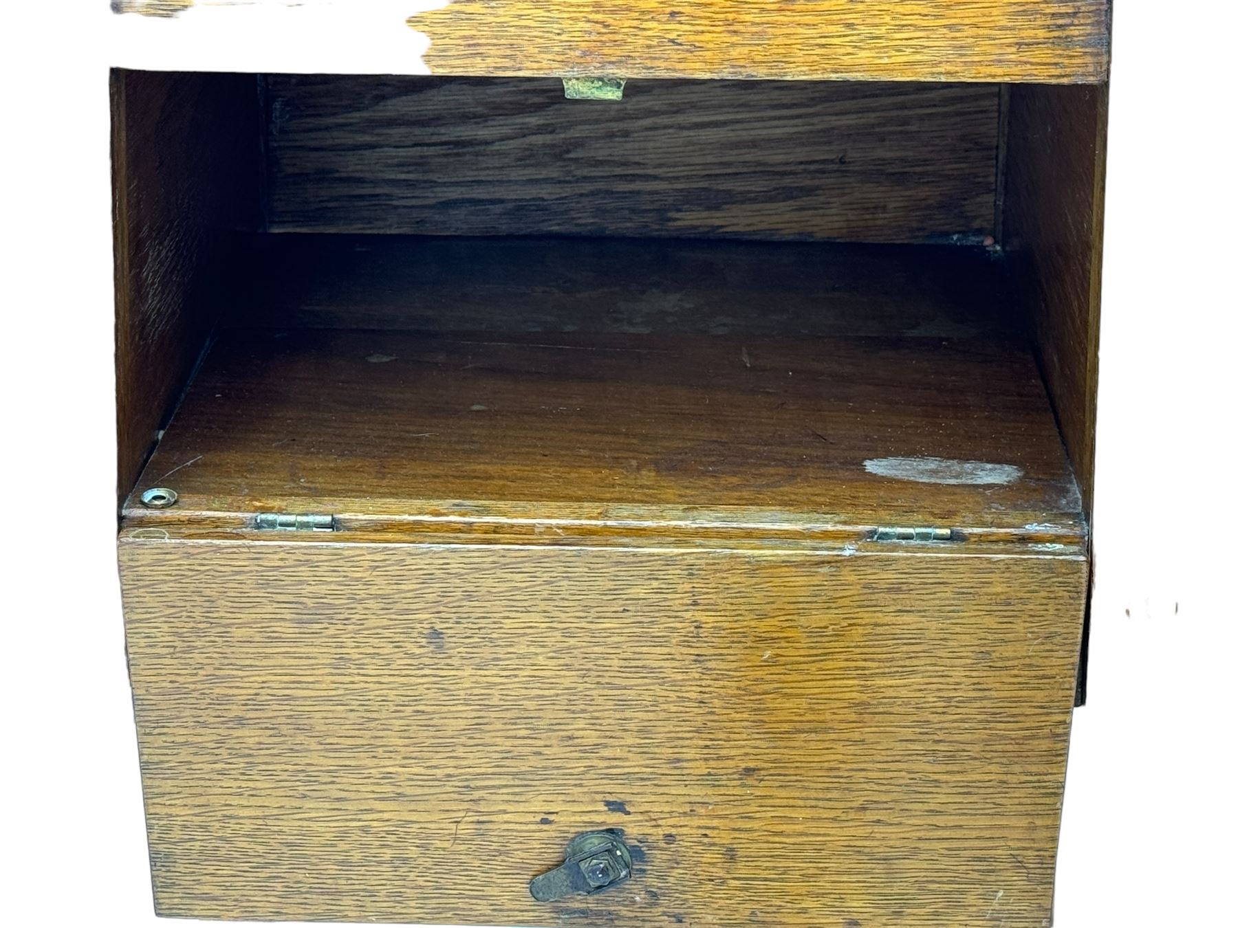 Early 20th century oak vanity stand, with circular adjustable mirror, brass towel rails to the sides, marble inset top and upper compartment, over additional storage compartment with hinged front, on splayed supports with stretchers