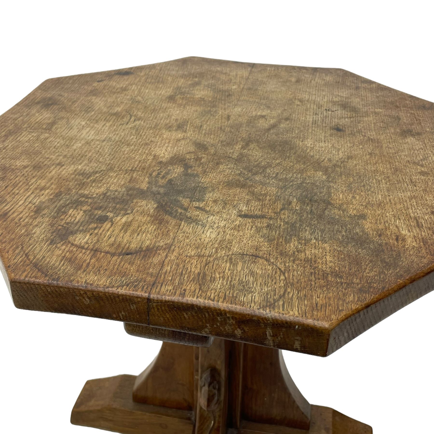 Mouseman - oak occasional table, octagonal adzed top, cruciform pedestal on sledge feet, carved with mouse signature, by the workshop of Robert Thompson, Kilburn 