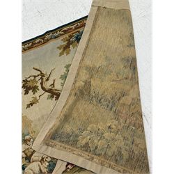 Large French machine woven tapestry, depicting figures in a landscape with a floral boarder 