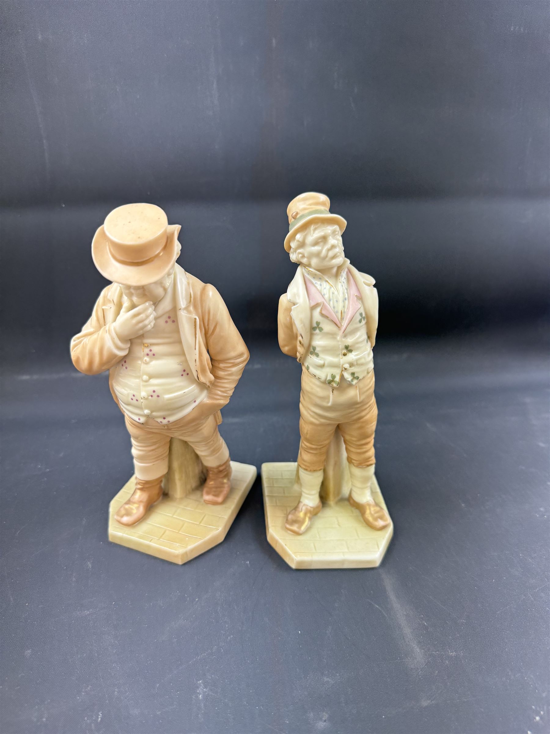 Two Royal Worcester blush ivory figurines, comprising Irish Man and John Bull, both with printed mark beneath, H18cm