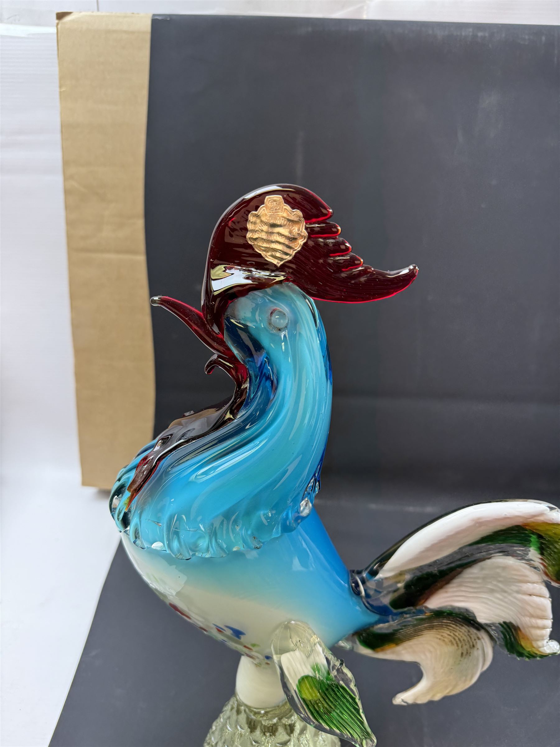 Two Murano glass clowns, together with similar glass figures, including cockerels and fish