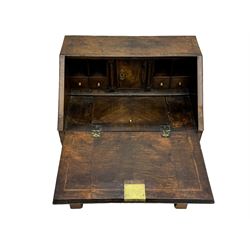 18th century walnut bureau, fall-front enclosing fitted interior with drawers and pigeonholes, over two short and two long drawers with brass escutcheon plates and handles, raised on bracket feet