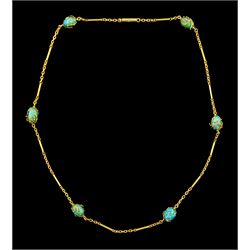 Gold turquoise link necklace, each turquoise with overlay wirework decoration