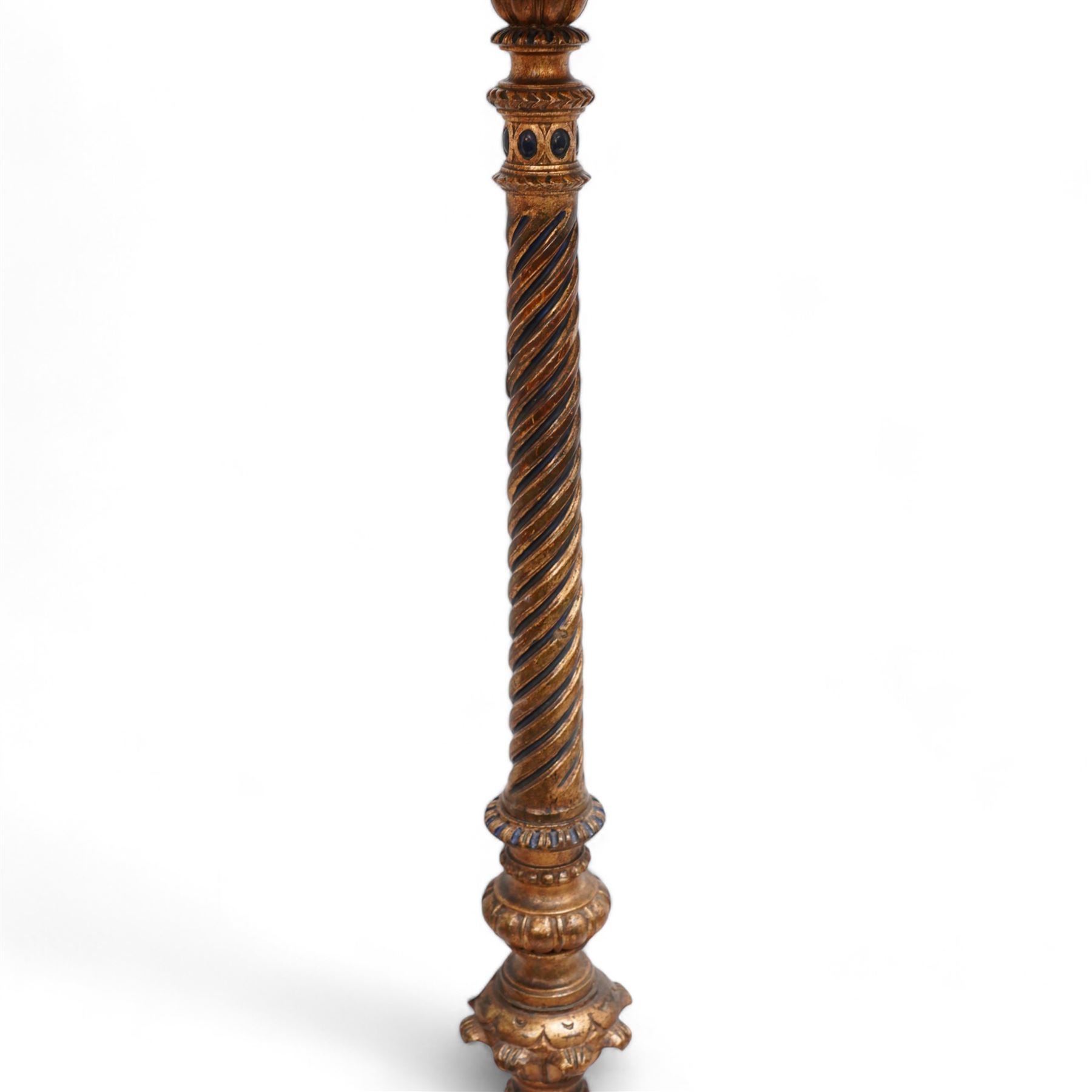 Neoclassical design gilt standard lamp, the turned ropetwist column decorated with egg-and-dart motifs and reeded elements, on circular base with scroll feet, with associated shade