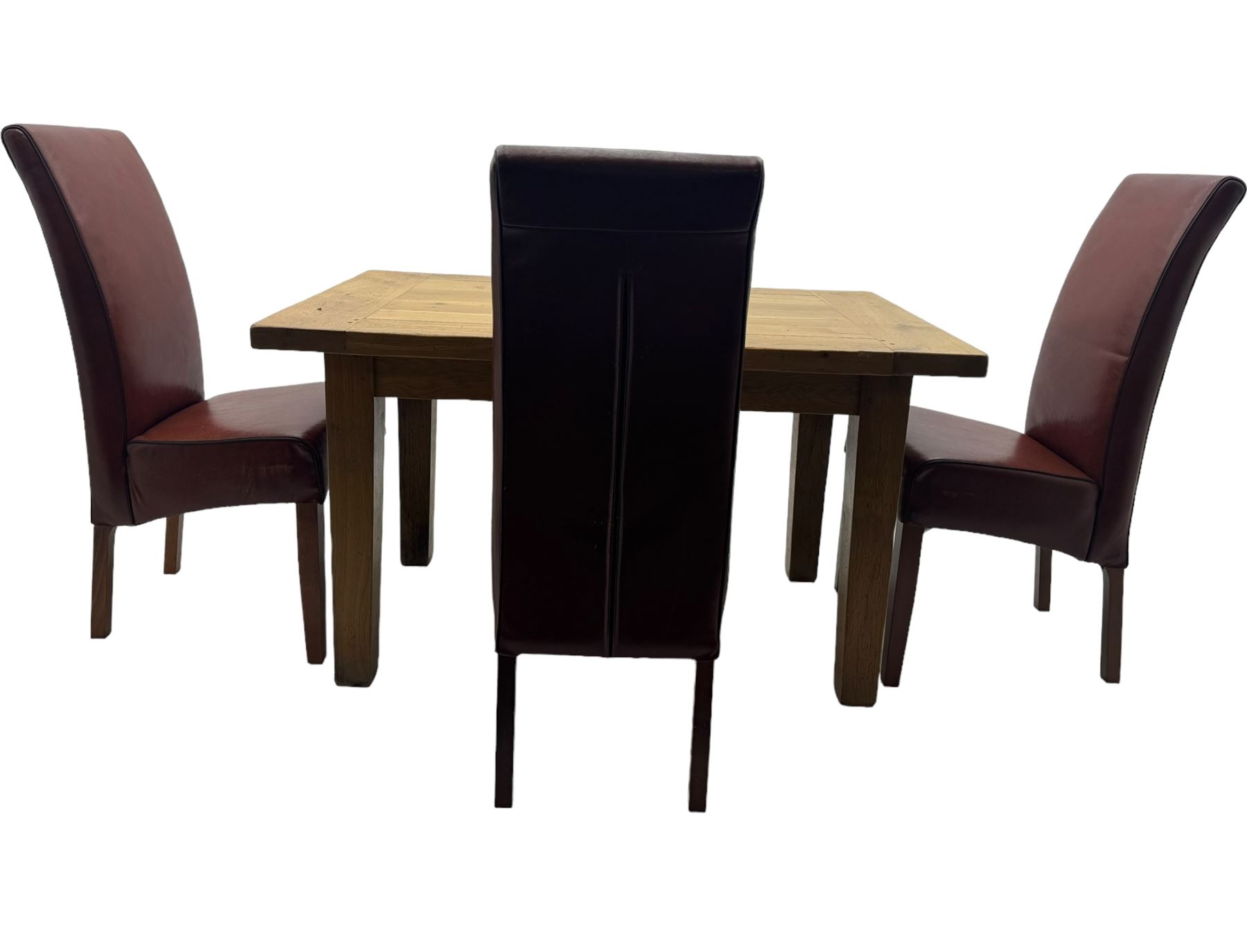 Oak dining table, rectangular plank with two extension leaves at each end, central drawer with brass handle, supported by square legs (L131cm - 233cm, D80cm, H76cm); four high-back dining chairs, the chairs upholstered in dark brown leatherette with stitched detailing, on square tapering legs (H108cm)