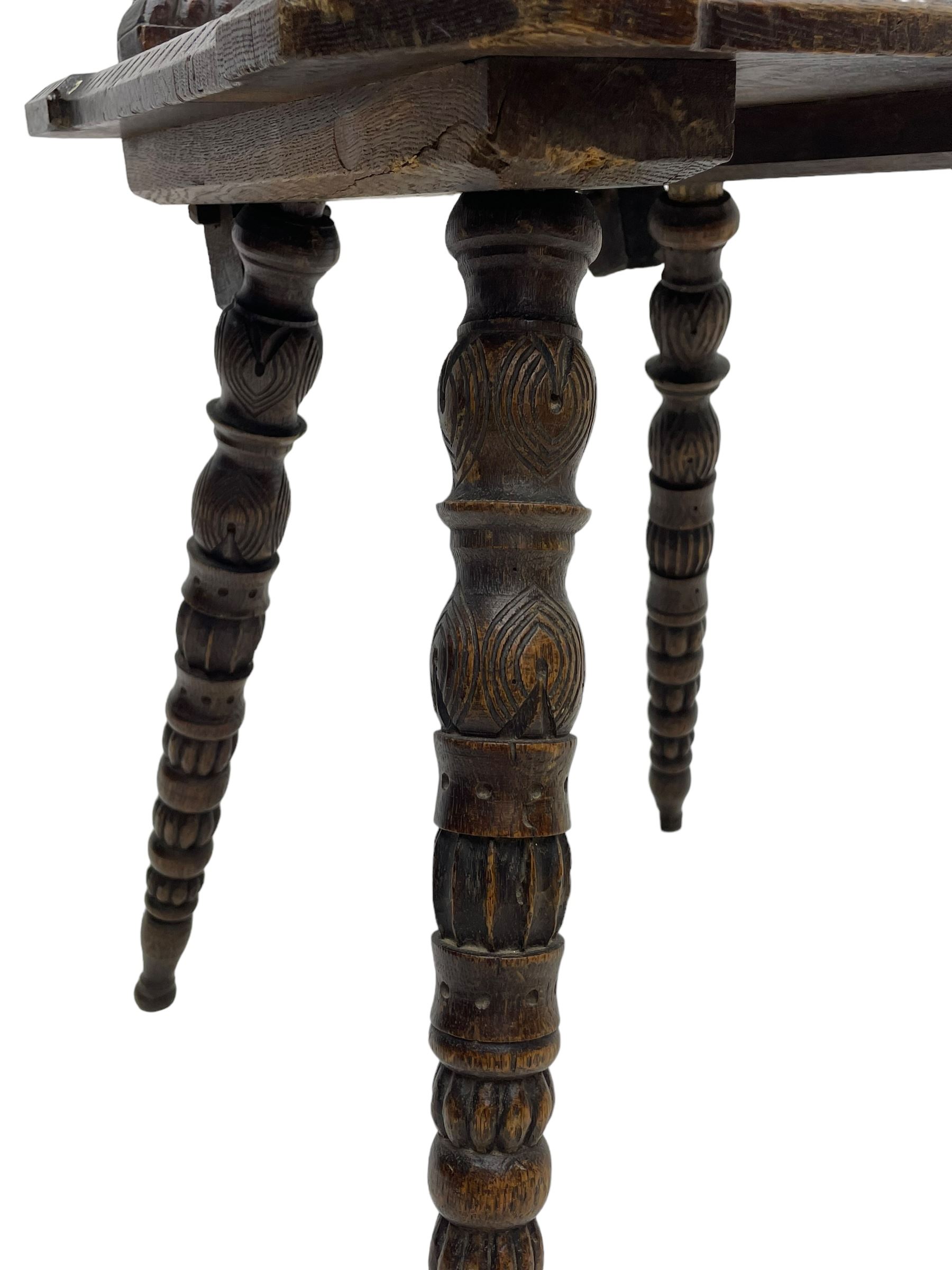 19th century oak hall chair, shaped and pierced back carved with crown cresting over curled and scrolled acanthus leaves, tapered rectangular seat with foliate carved corners and fluted chamfered edge, on turned and lobe carved splayed supports 