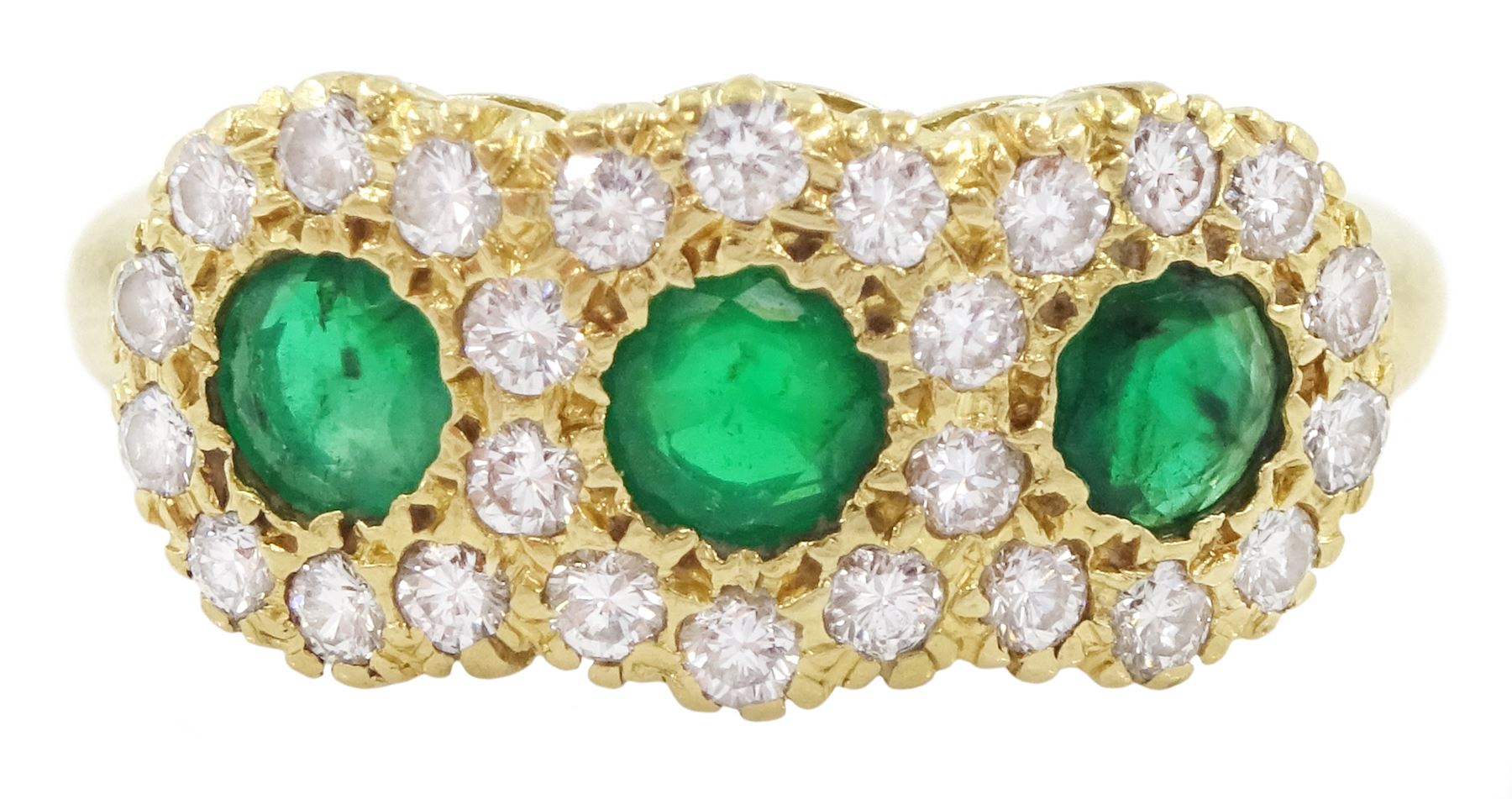 18ct gold emerald and diamond cluster ring, three round cut emeralds, with round brilliant cut diamond surround, London 1976