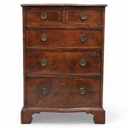 Georgian design yew wood serpentine chest, moulded and crossbanded top over two short and three long graduating cock-beaded drawers, circular pressed brass handle plates with hoop handles, fitted with slide, on bracket feet