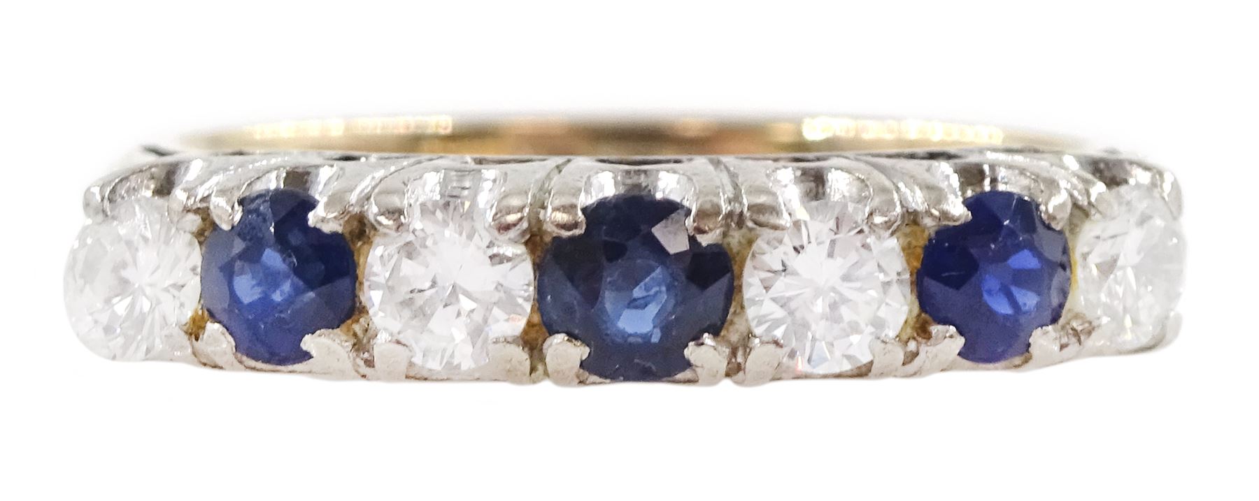 Gold and silver seven stone round brilliant cut diamond and sapphire ring, total diamond weight approx 0.40 carat