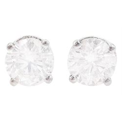 Pair of platinum round brilliant cut diamond stud earrings, hallmarked, total diamond weight approx 1.40 carat